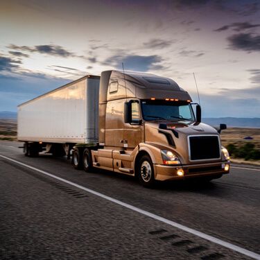 Nogales Cross Border Shipping Tan Semi Truck On Highway